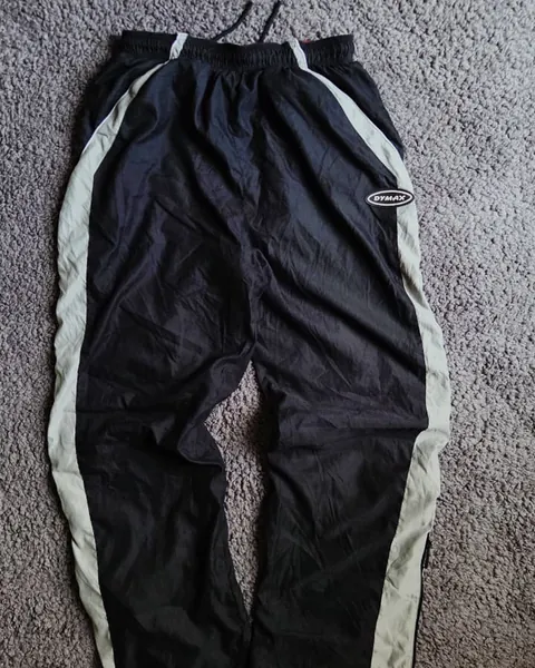 Pantalón rompevientos Dymax